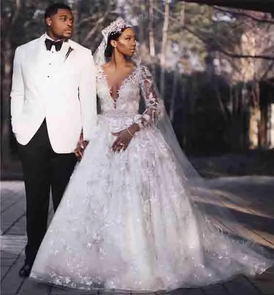 Ball Gown Deep V-Neck Long Sleeves Ivory Wedding Dress with Lace Appliques DME98