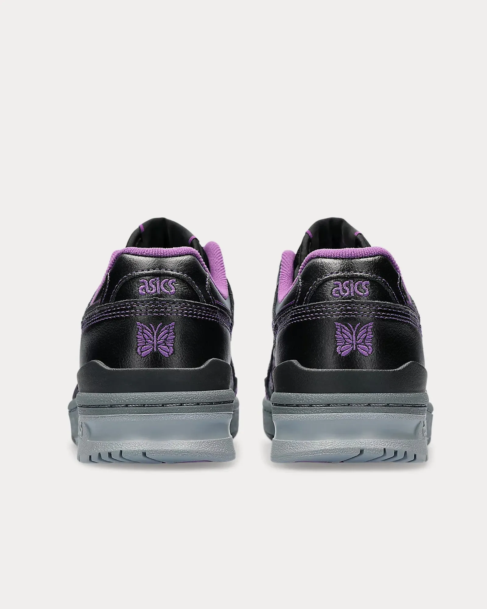 EX89 Black / Black Low Top Sneakers