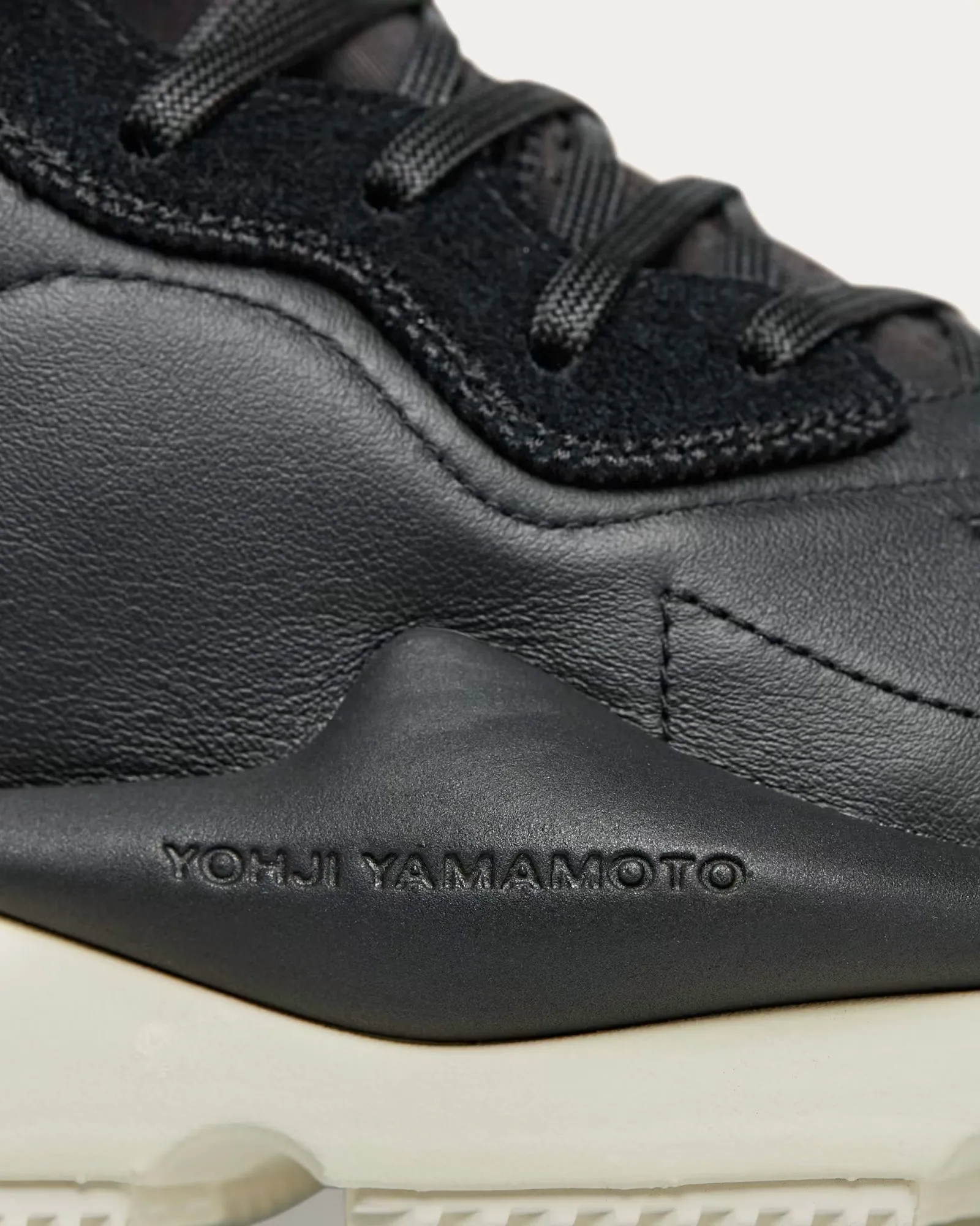 Kaiwa Black / Black / Off White Low Top Sneakers
