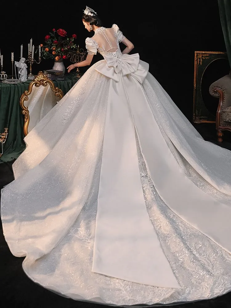 Main wedding dress 2024 new bride retro temperament heavy industry court style thin long trailing out yarn high sense