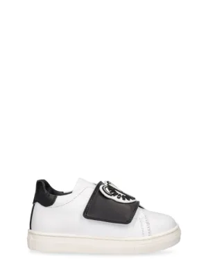 Moschino   Leather strap sneakers w/ patches 